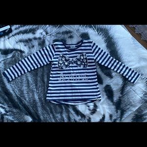 Blue and white striped shirt. Size 128.